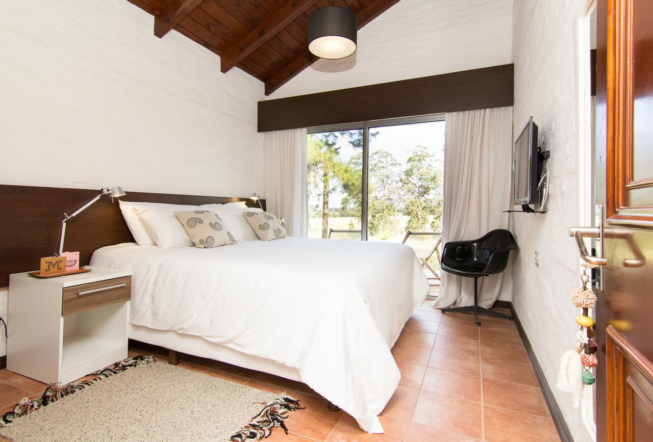 Posada Mosaico Villas Garzon Room photo